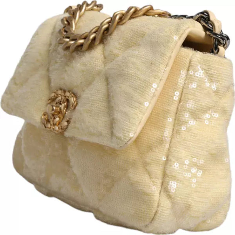 حقيبة متوسطة الحجم مطرزة بالترتر باللون الأصفر من سلسلة مبطنة