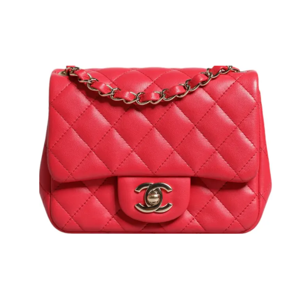 محفظة صغيرة من جلد الحمل الوردي مع سلسلة كتف